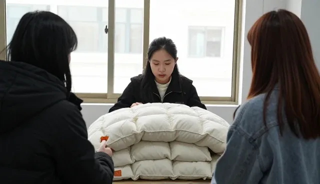 无锡天弘羽绒制品有限公司布局来料加工领域,提升在加工精度价值